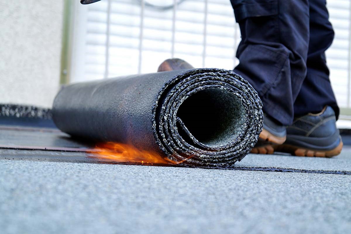 Felt flat roof being installed